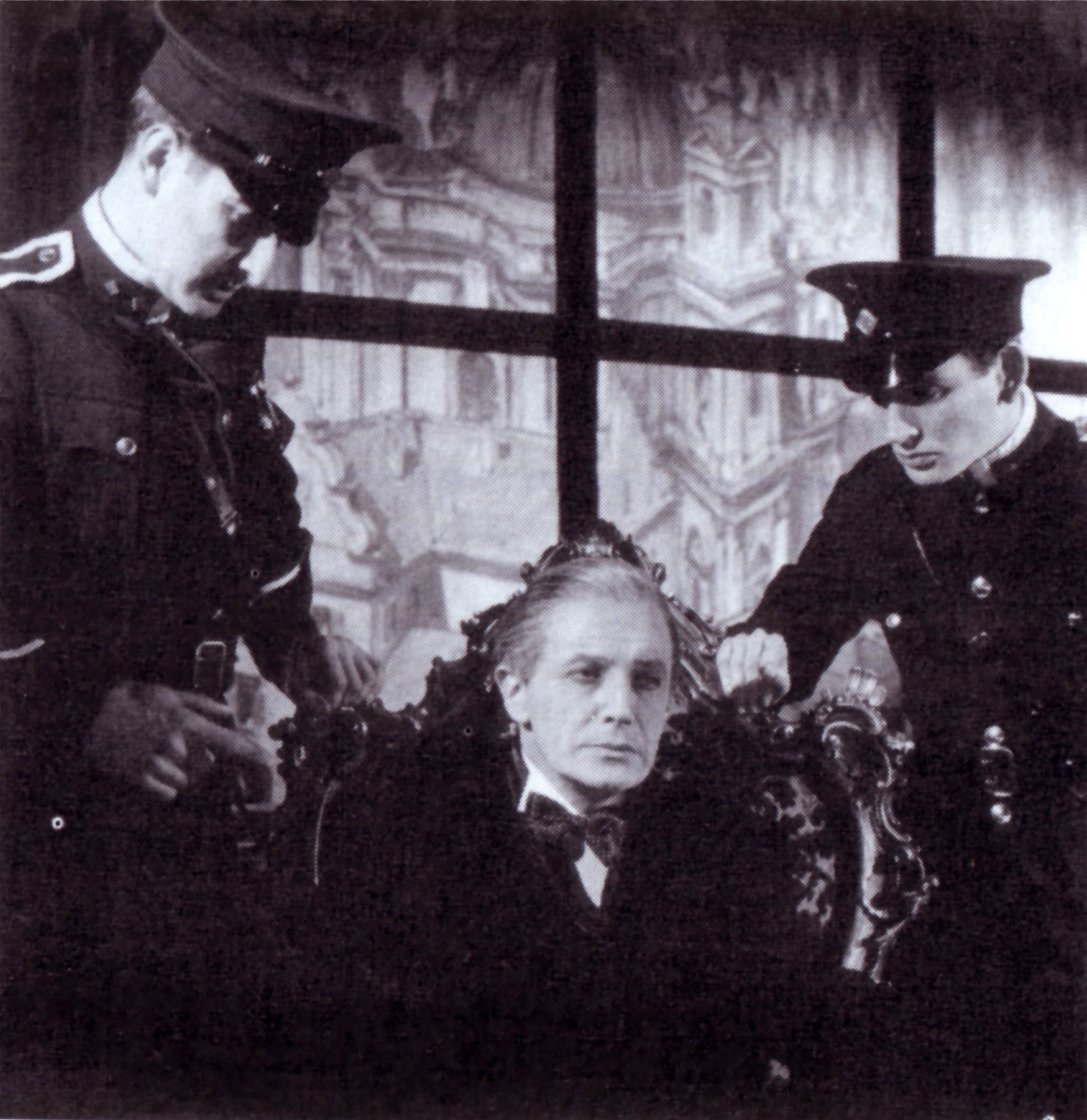 Ivor Novello as Rudi Kleber, being arrested by the Nazis. Scene from the original London production.