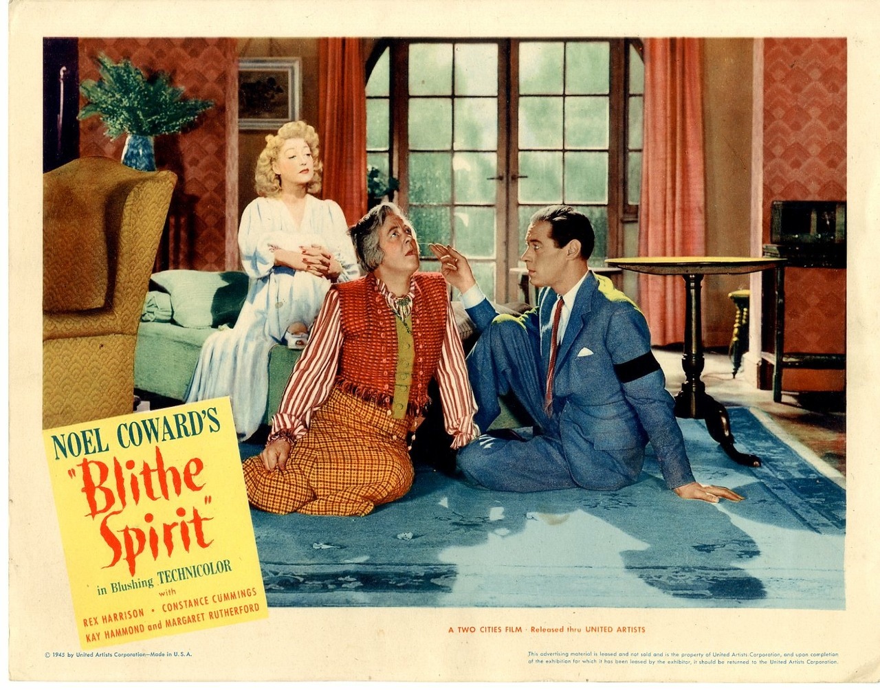 Poster for the film version of "Blithe Spirit", starring Rex Harrison. 