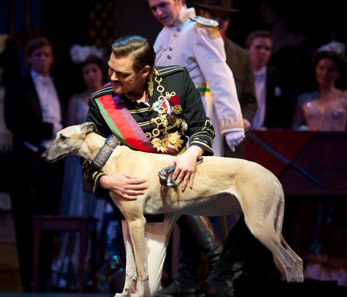 The abdication scene, in act 2, where the king (Clark Sturdevant) leaves his country to go into exile - with his dog. (Photo: Ohio Light Opera)