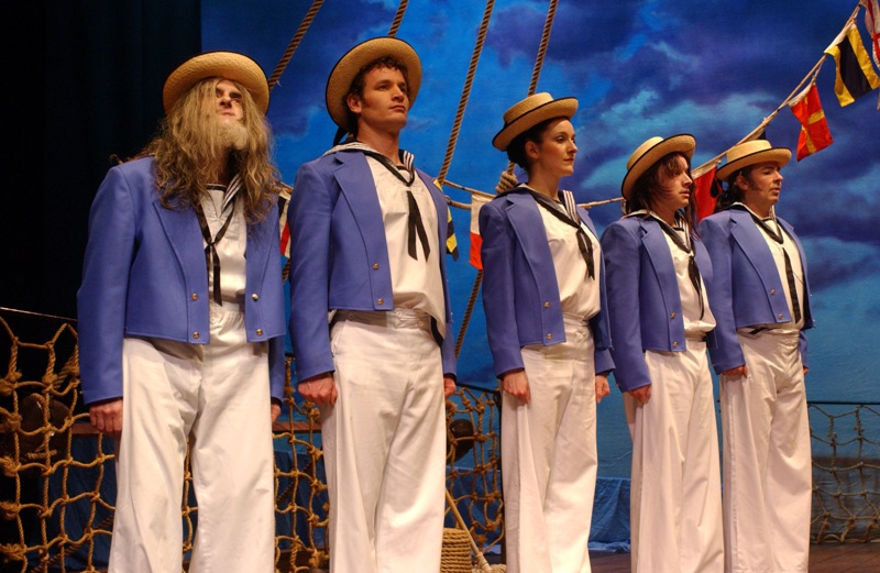 Scene from "HMS Pinafore" with a mixed sailor's chorus.