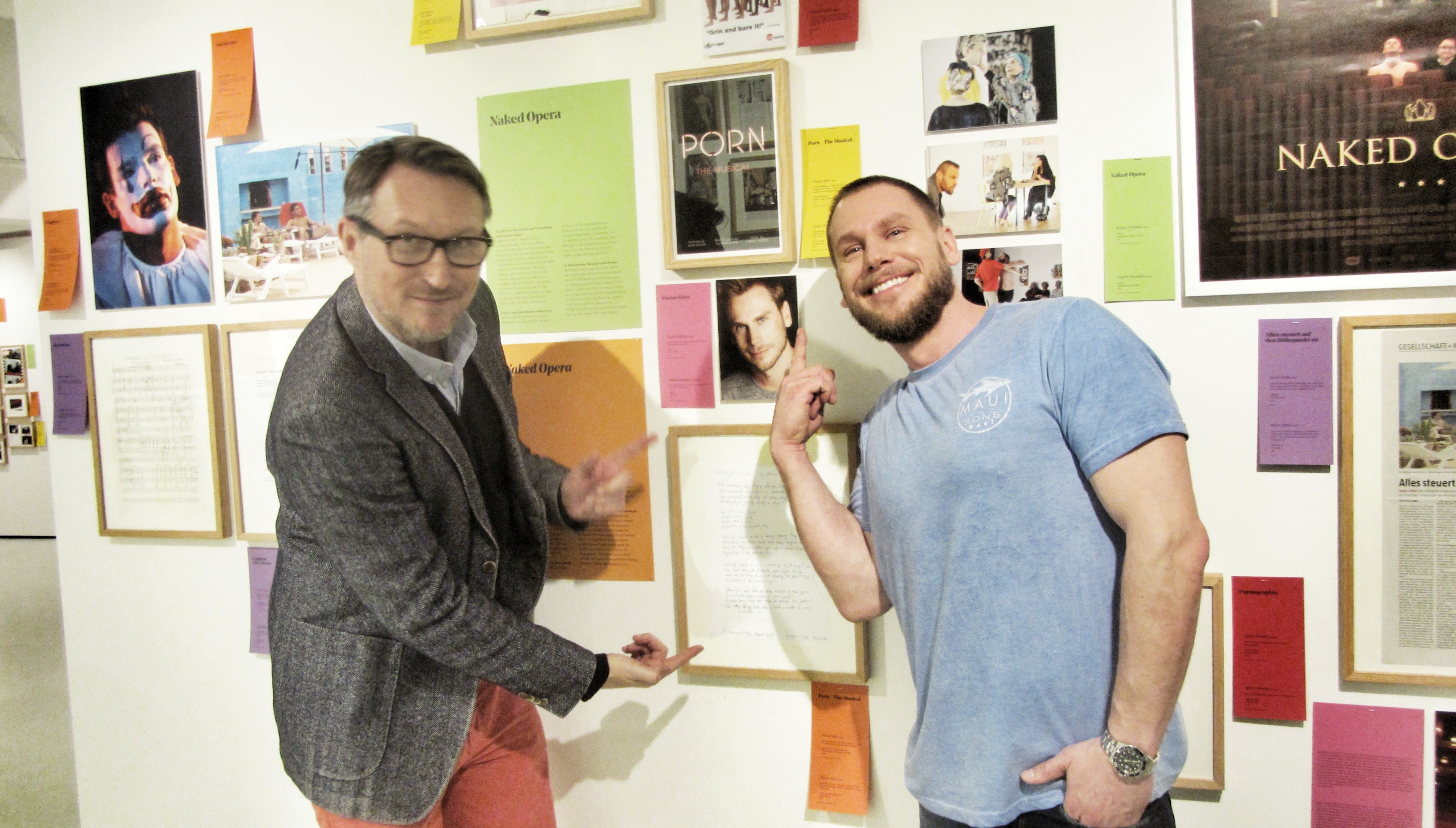 Florian Klein (r.) visiting the Schwule Museum* and the exhibition "Porn That Way" of which his musical is part. (Photo: Schwules Museum*)