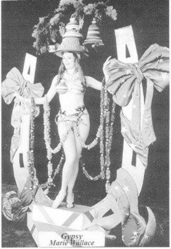 Marie Wallace standing on a large horseshoe. (Photo: John Ellis Archive)