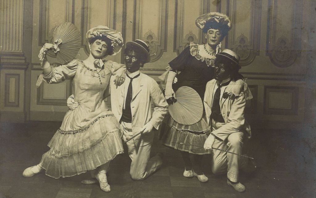 A group of cross-dressed German performers, together with two "black face" actors at the beginning of the 20th century. (Photo: Schwules Museum*)