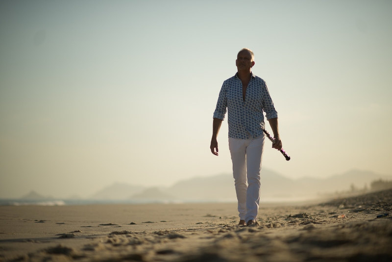 Nigel Shore walking down the beach in Rio de Janeiro. (Photo: Costa Records)