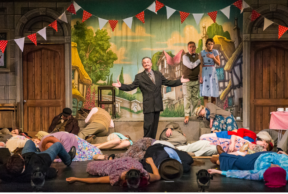 End of Act One: all the villagers have drunk the tea laced with the love potion and have all fallen asleep for 12 hours: when they awake they will fall in love with the first person (of the opposite sex of course!) that they see! "The Sorcerer," production by the National Gilbert and Sullivan Opera Company, 2018. (Photo: Jane Stokes)