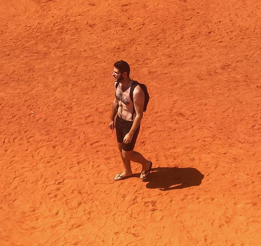 Bass-baritone Romain Dayez walking the desert. (Photo: Instagram/romaindayez) 