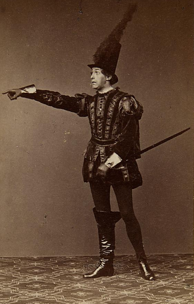 Wilhelm Knaak in 1860 as the "blood red" Hanns Styx in "Orpheus in der Unterwelt" at Carl-Theater, Vienna. (Photo: Emil Rabending)