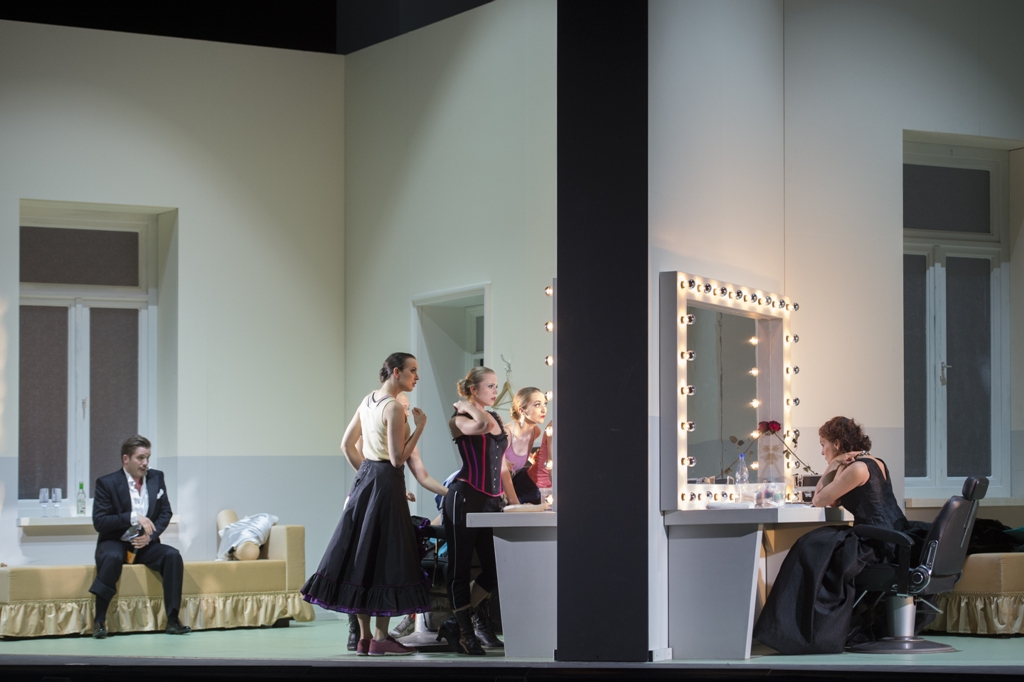 Iurii Samoilov as Danilo, Grisettes, and Marlis Petersen as Hanna in "Lustige Witwe" at Oper Frankfurt, 2018. (Photo: Monika Rittershaus)