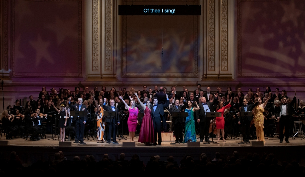 The cast at Carnegie Hall singing "Of thee I sing" in 2019, as part of the "Let 'Em Eat Cake" performance by MasterVoices. (Photo: Erin Baiano)