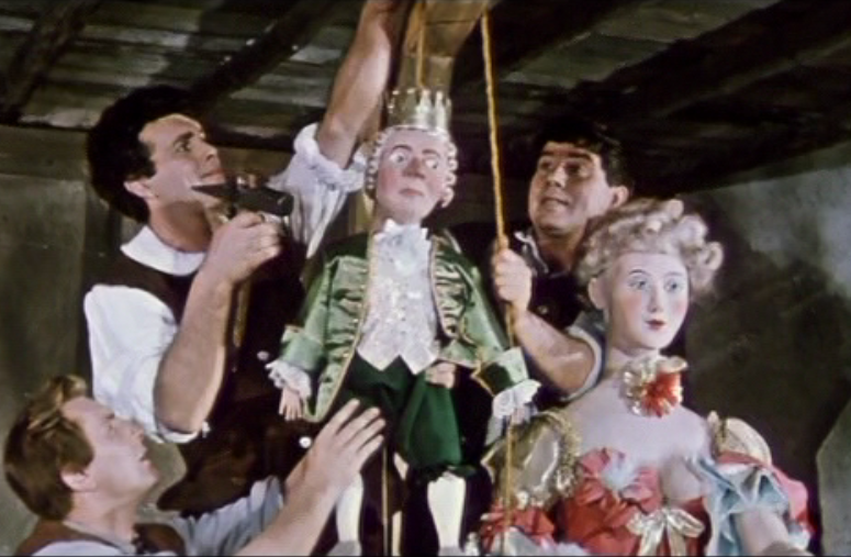 Campistrel and his friends hand Louis XV and Madame Pompadour as a carnival joke. (Photo: Screenshot from the 1960 DEFA film version of "Die schöne Lurette")