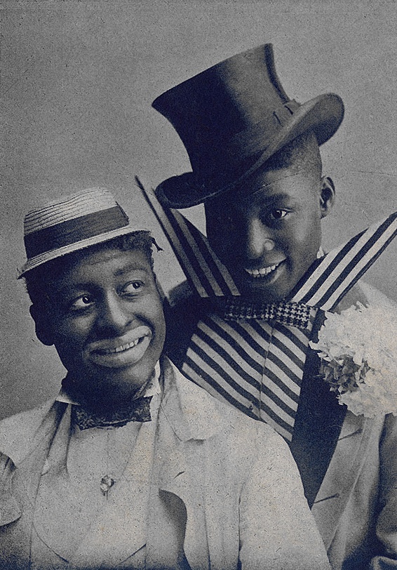 Vaudeville performers Bert Williams (l.) and George Walker in blackface and comic outfits.