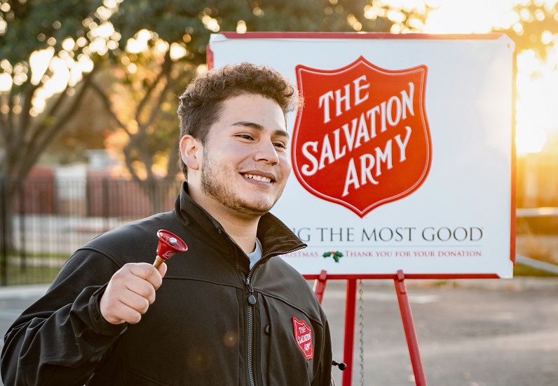 A young man collecting money for the Salvation Army, founded in 1865. (Photo: Tim Mossholder / Unsplash)