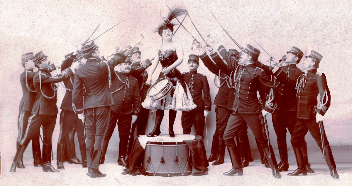 Fritzi Scheff, with drum and male chorus, as “The Mascot of the Troop” in the 1905 production of "Mlle. Modiste." (Photo: John Guidinger Collection)