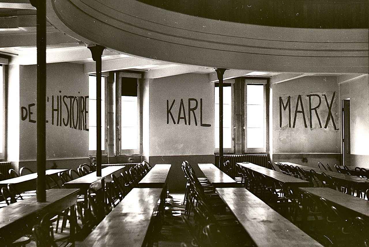 Class room at the University of Lyon with markings on wall, made during the student occupation of parts of the campus as part of the May 1968 events in France. (Photo: George Louis / CC BY-SA 3.0 Deed)